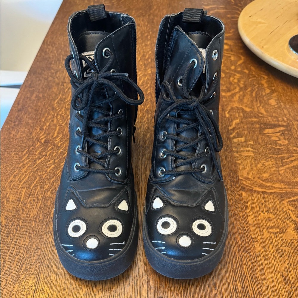 Sized 8 Super cute Tuk boots. purchased from Mod Cloth.